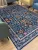 Carpetum kék alapon virágmintás vintage szőnyeg 160x230 cm